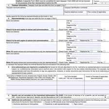 An accountant reviewing financial and tax documents.