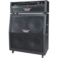 A stack of amplifiers beside an electric guitar.