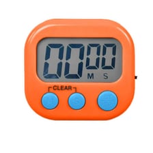 A teacher collecting exam papers as a classroom timer runs out