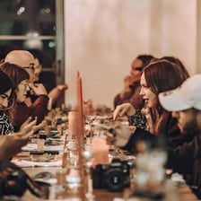 People dining together at a restaurant table