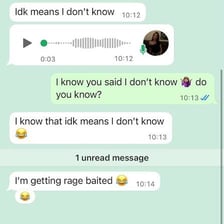 A phone displaying a text-message exchange using “IDK.”