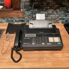 A vintage office fax machine.