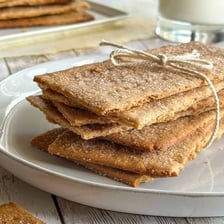 Graham crackers displayed on a plate.