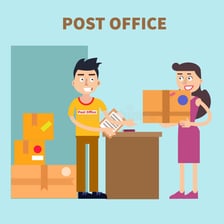 A postal worker handling a letter and parcel at a post office