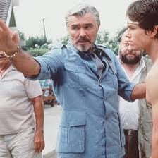 Burt Reynolds in a scene or promotional image from Boogie Nights