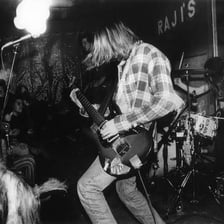 A live performance by Nirvana, a band associated with alternative rock.
