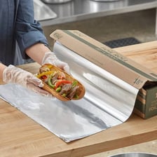 A roll of metallic foil used for wrapping food.