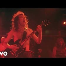 AC/DC performing live, the band known for “Highway to Hell.”