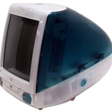 A colorful translucent Apple iMac G3 desktop computer