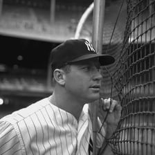 A portrait of Mickey Mantle in a New York Yankees uniform.