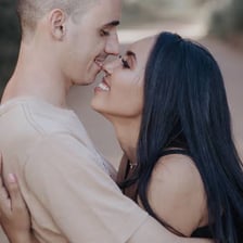 A man and woman standing together.