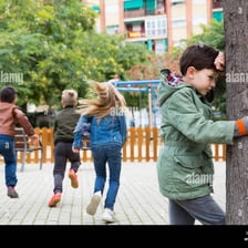 Children playing hide-and-seek outdoors