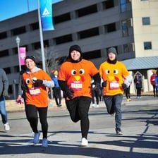 Runners participating in a Thanksgiving Turkey Trot.