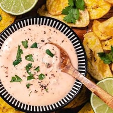 Bowls of mayonnaise and salsa served as dips