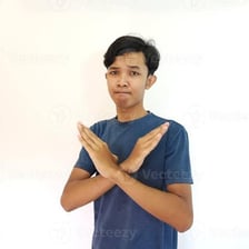 A person making a gesture of mild disapproval.