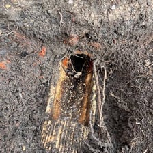Water gradually passing through soil.