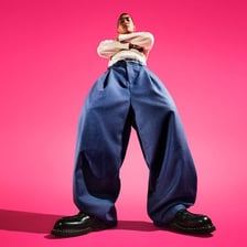 A person wearing loose-fitting oversized pants.