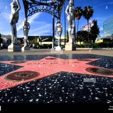 A brass star set into the sidewalk on the Hollywood Walk of Fame.