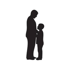A father and son standing together