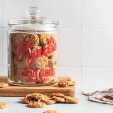 A glass jar filled with cookies