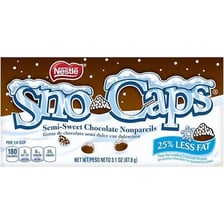 A box of SNO-Caps chocolate candies with white sprinkles.