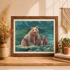 A mother bear standing near her cub