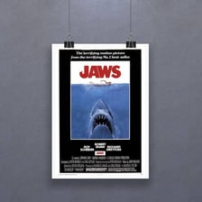 Poster imagery for the 1975 film Jaws featuring a great white shark.