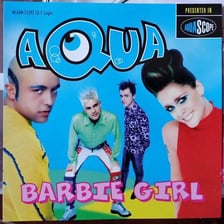A still or promotional image associated with Aqua’s “Barbie Girl” music video.