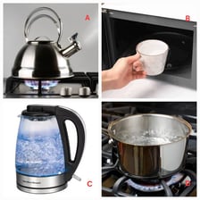 A kettle bringing water to a boil for tea