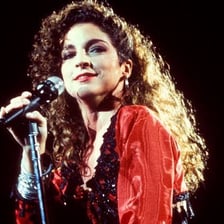 Gloria Estefan performing onstage.