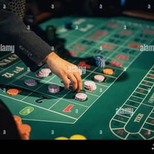 Casino chips being used to place wagers