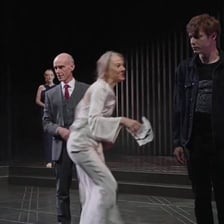 An actor portraying Hamlet during the famous soliloquy.