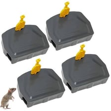 A small mouse trap baited for catching a mouse