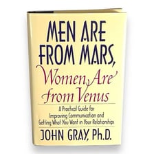 A book cover displaying the phrase Men Are from Mars, Women Are from Venus.