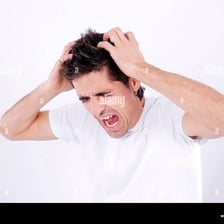 A visibly angry person expressing frustration