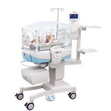A newborn infant receiving care in a neonatal hospital unit