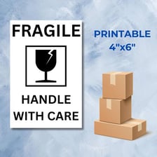 A shipping box marked as fragile and requiring careful handling