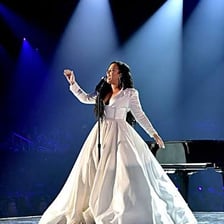 Demi Lovato performing on stage