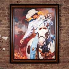 A cowboy riding a horse in a Western landscape.