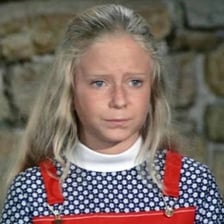 Jan Brady from The Brady Bunch looking frustrated about being overshadowed