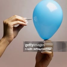 Balloon captured at the moment it bursts