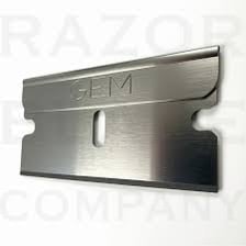 A close-up view of the sharp edge of a razor blade.