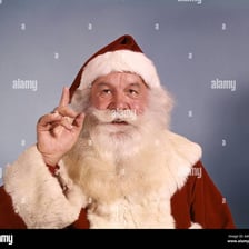 A person making a gesture asking someone to wait briefly