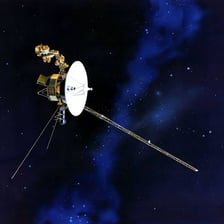 An artist’s depiction of NASA’s Voyager spacecraft traveling through deep space