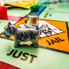 A Scottie dog token from a Monopoly board game