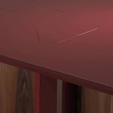 A glossy lacquer coating on a wooden surface.