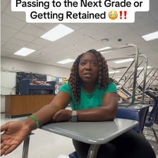 A student looking at a failing grade on an academic paper