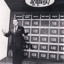 Art Fleming hosting the original Jeopardy! television quiz show