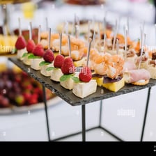A small snack and drink arranged as refreshments on a table.