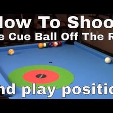 A billiard ball rebounding after striking the table cushion.
